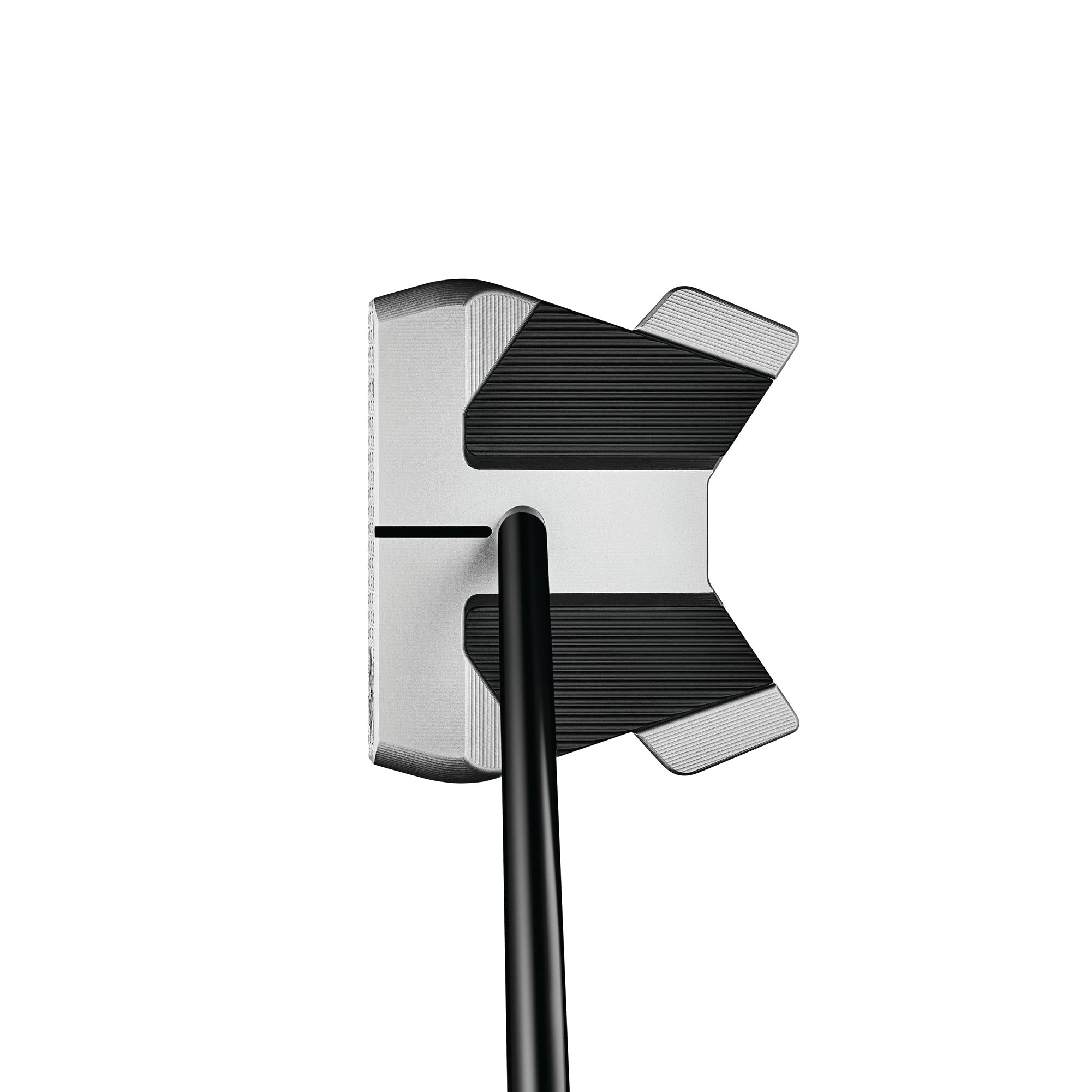 Close-up of a golf putter head on a white background
