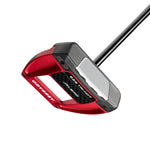 Red and black golf putter on a white background