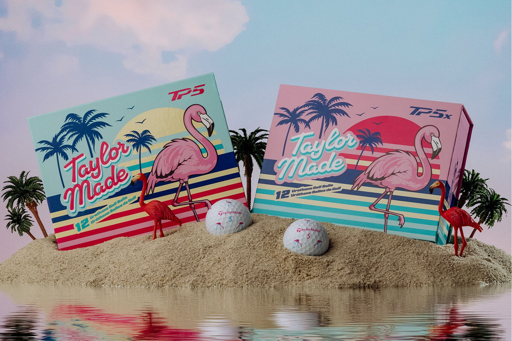 Two Taylor Made golf ball boxes with flamingo design on a beach setting